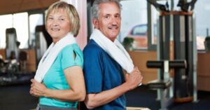 and elderly couple at the gym